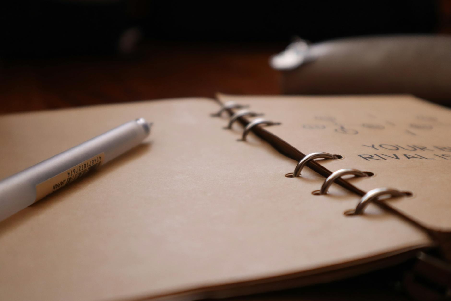 a pen on a notebook